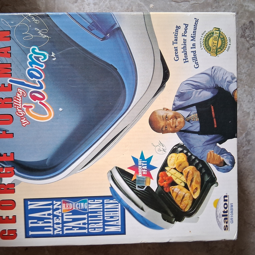 George Foreman Grilling Machine with Blue Lid